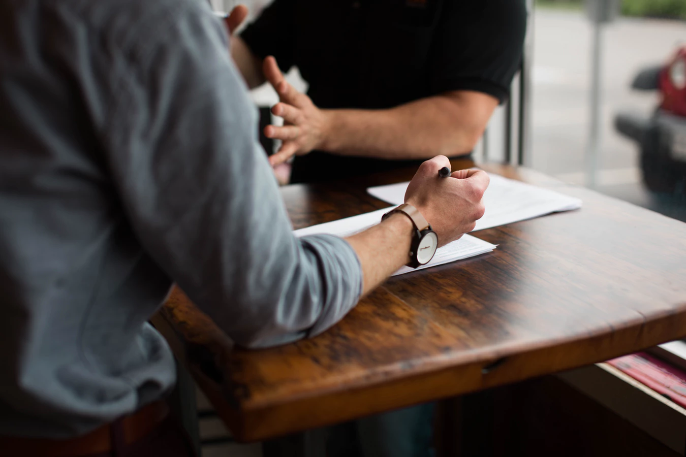 two people discussing a resume