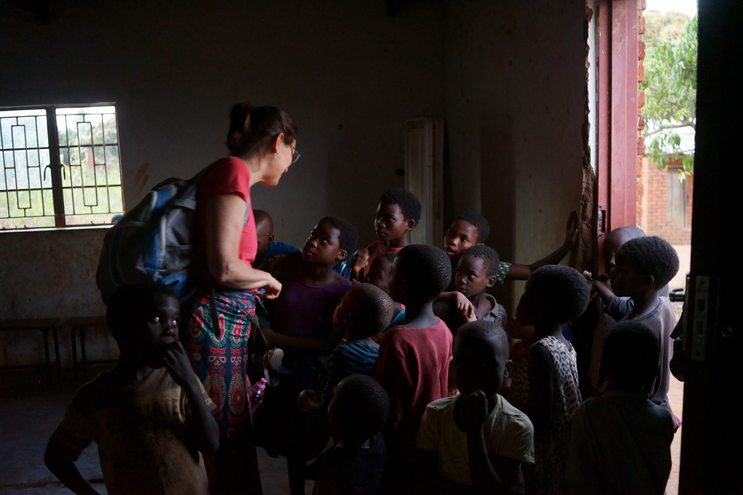 Dr. Barbara R Edwards, Princeton internist, surrounded by the children of Malawi