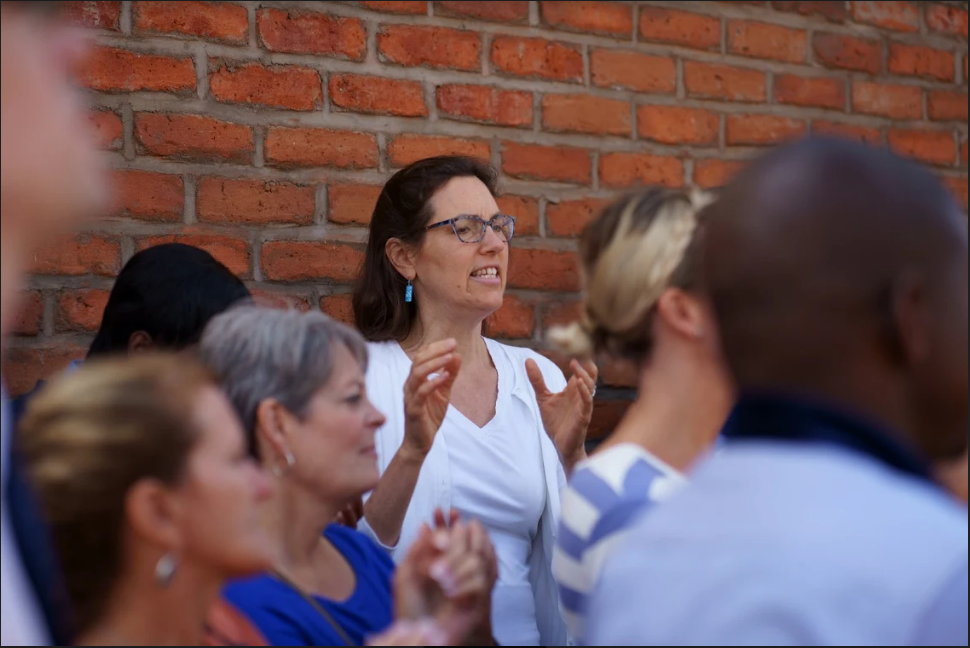 Dr. Barbara Edwards, Princeton internist, speaking to her volunteer group in Malawi