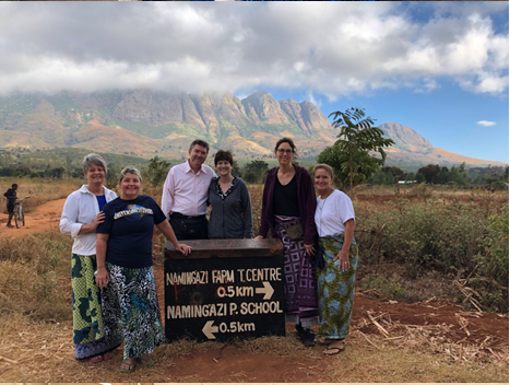 Dr. Barbara Edwards, Princeton internist, standing with other volunteers on the Malawi mission trip