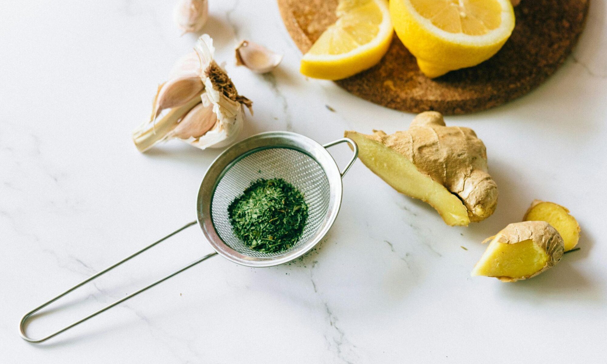 Colorful fruits, vegetables, and yogurt arranged in the shape of a shield